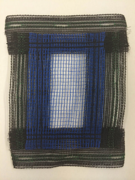 画像：周囲ボタンホール加工